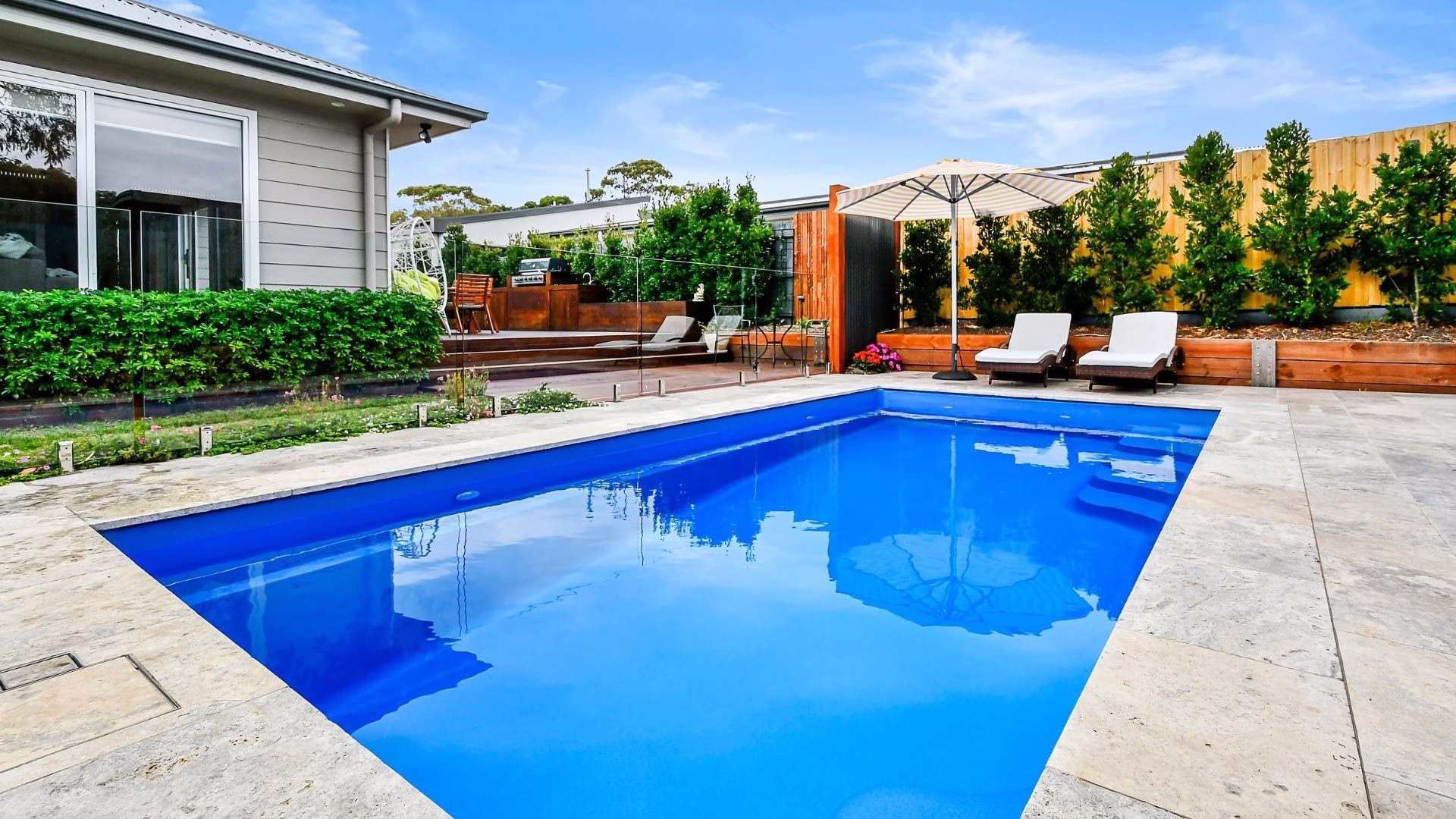 10 inspiring fiberglass pool landscaping ideas to elevate your backyard