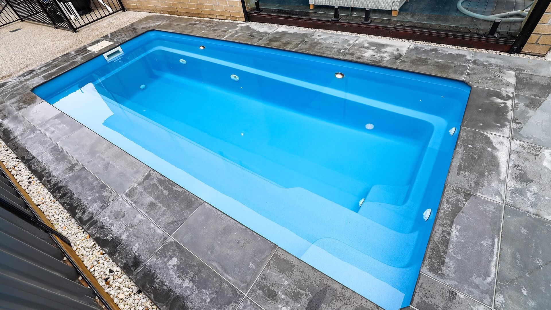 how a fiberglass pool can increase your propertys value