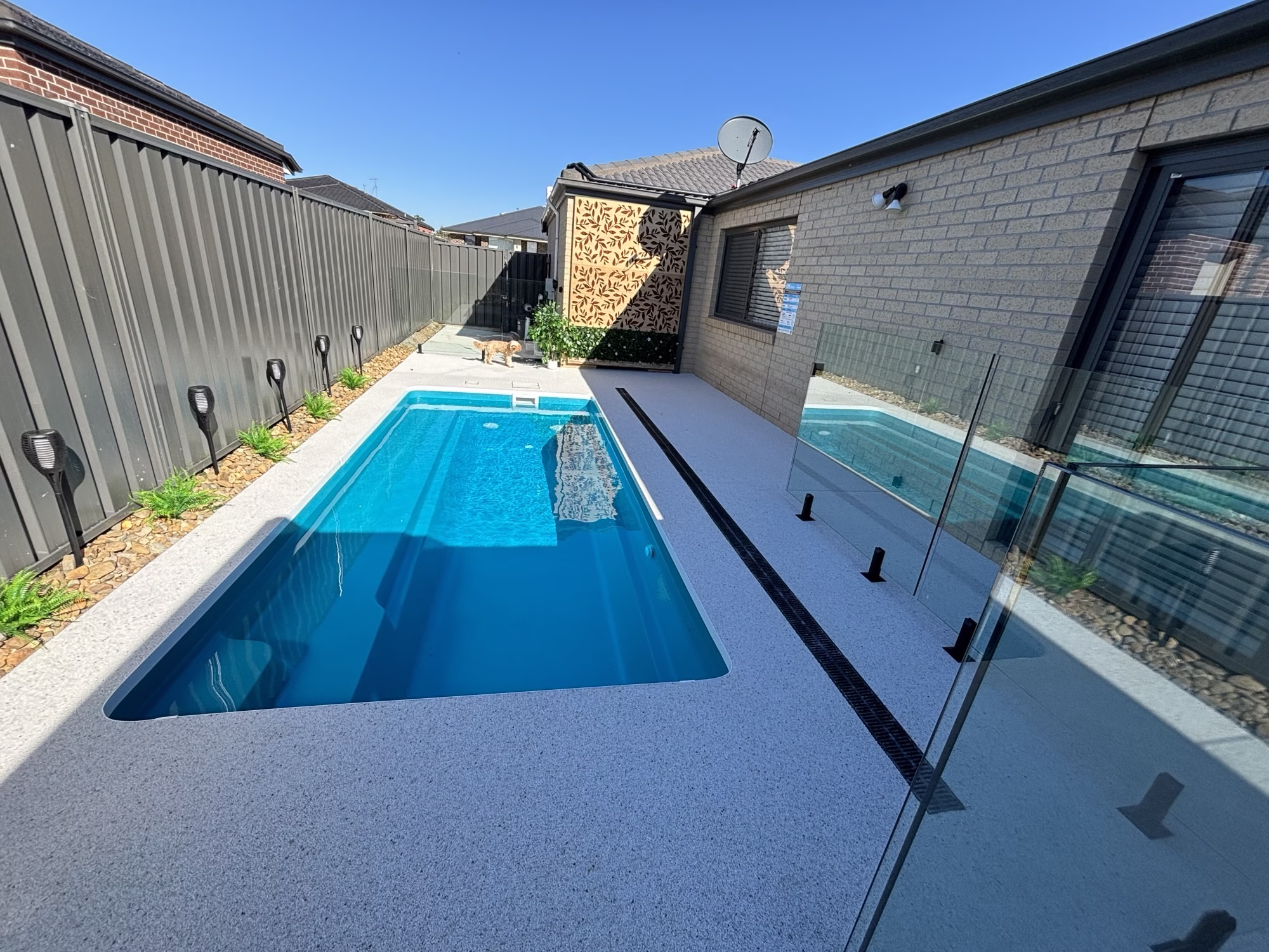10 inspiring fiberglass pool landscaping ideas to elevate your backyard